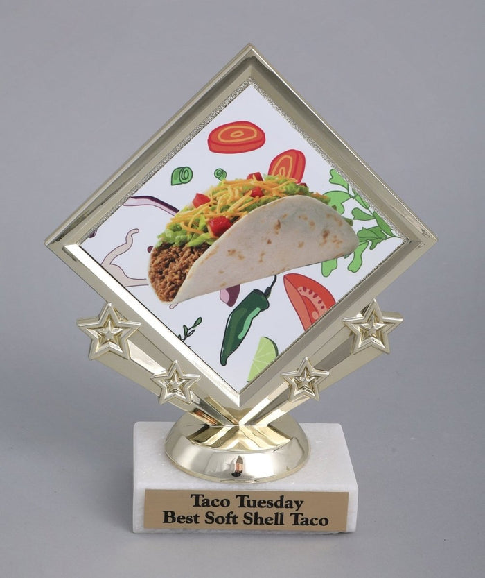 Diamond Taco Logo on star holder on white marble base with gold engraving plate